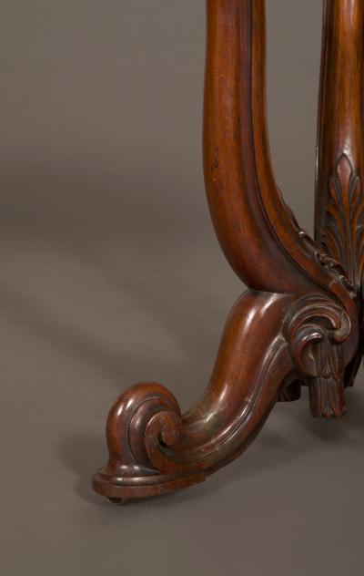 A Mahogany Center Table of Interesting Design With Inset Septarian Nodule Top