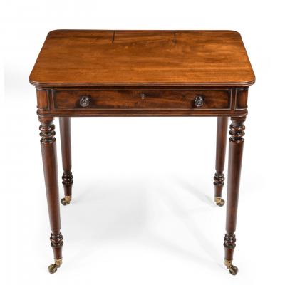 A Mahogany chamber writing table by Gillows