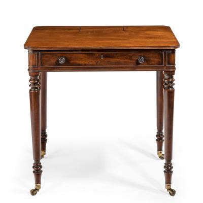 A Mahogany chamber writing table by Gillows
