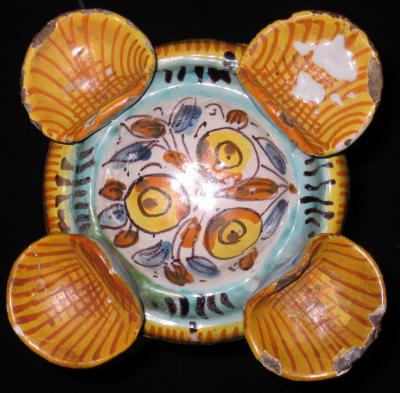 A Majolica Polychrome Salt Cellar with Four Caryatid Lions on a Quatrefoil Base