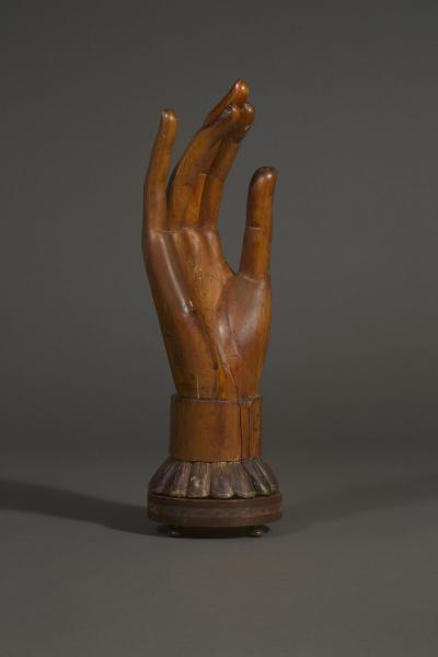 A Massive and Elegantly carved Wooden sculpture of a Lady s gloved hand