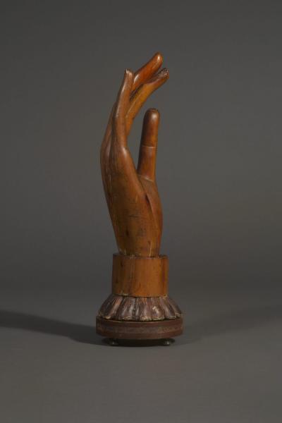 A Massive and Elegantly carved Wooden sculpture of a Lady s gloved hand