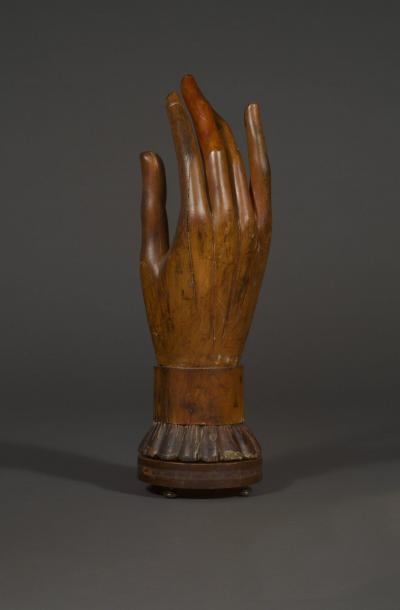 A Massive and Elegantly carved Wooden sculpture of a Lady s gloved hand