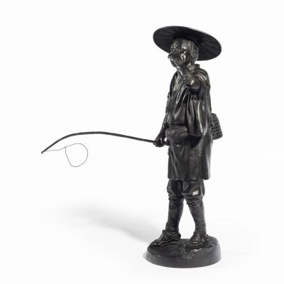 A Meiji period bronze of a cricket catcher