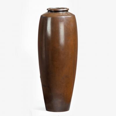A Meiji period bronze vase by Yoshiharu