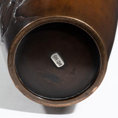 A Meiji period bronze vase by Yoshiharu