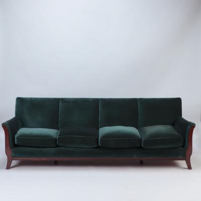 A Mid Century Modern French large sofa with green velvet upholstery circa 1945 