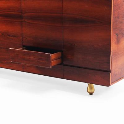 A Mid Century Modern rosewood sideboard C 1950 