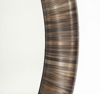 A Modernist Mirror executed in meticulous straw marquetry