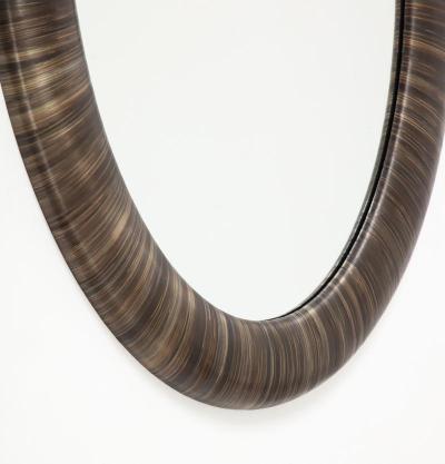 A Modernist Mirror executed in meticulous straw marquetry