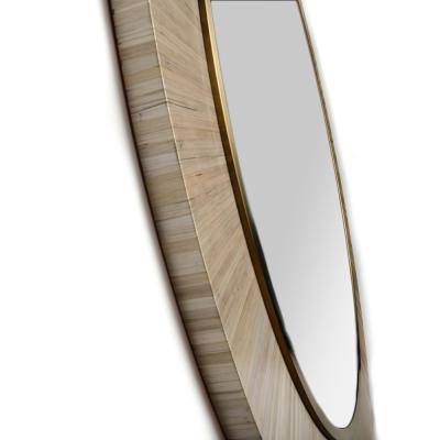 A Modernist round mirror executed in meticulous straw marquetry contemporary