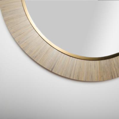 A Modernist round mirror executed in meticulous straw marquetry contemporary