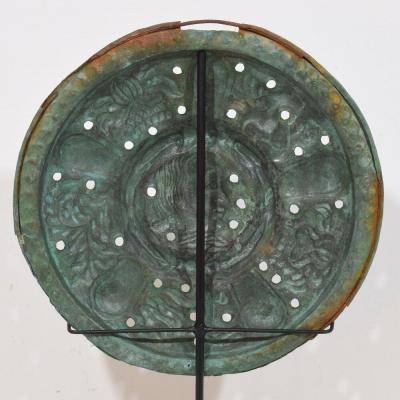 A Mounted 17th Century Folk Art Brass Bassinoire Cover from France