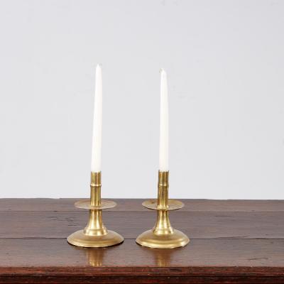 A Near Pair of 17th c English Brass Candlesticks