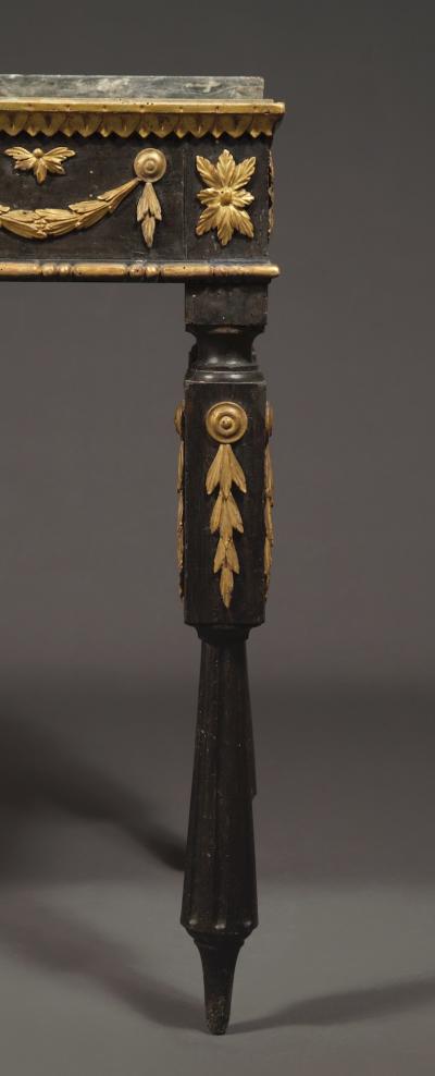 A Neoclassical Period Ebonized And Giltwood Side Table