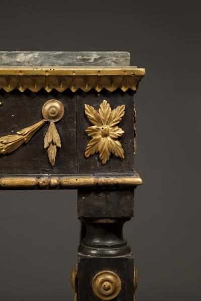 A Neoclassical Period Ebonized And Giltwood Side Table