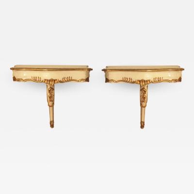 A PAIR OF 1940S WALL MOUNT CONSOLES