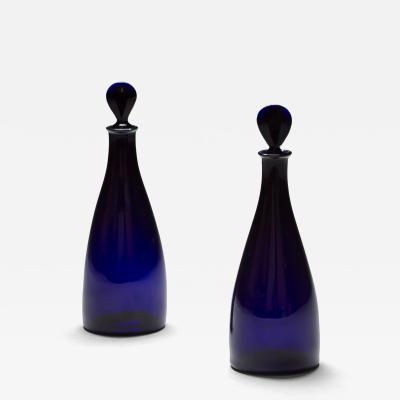 A PAIR OF BRISTOL BLUE SPIRIT DECANTERS