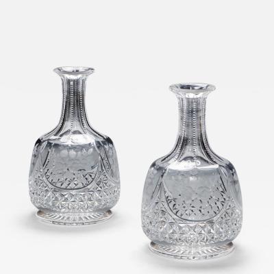 A PAIR OF CUT ENGRAVED WATER CARAFES