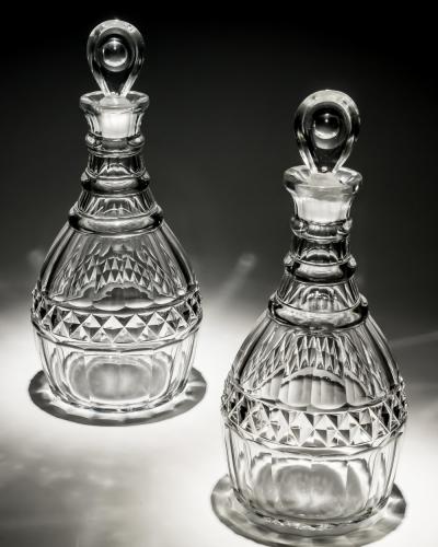 A PAIR OF CUT GEORGIAN DECANTERS