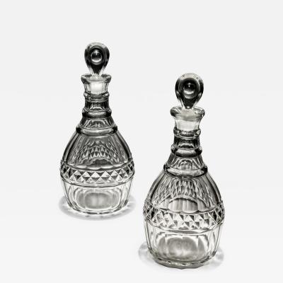 A PAIR OF CUT GEORGIAN DECANTERS