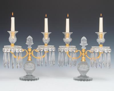 A PAIR OF DIAMOND CUT REGENCY CANDELABRA