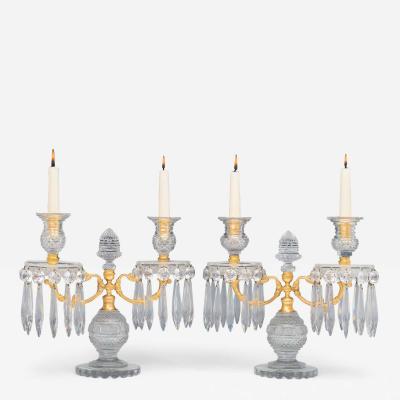 A PAIR OF DIAMOND CUT REGENCY CANDELABRA