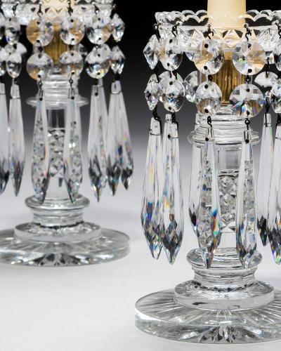 A PAIR OF DIAMOND CUT REGENCY LUSTRES