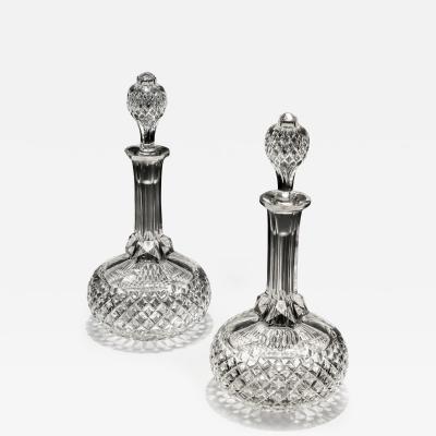 A PAIR OF DIAMOND CUT VICTORIAN DECANTERS