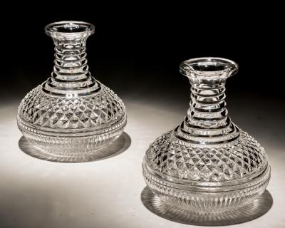 A PAIR OF DIAMOND STEP CUT CARAFES