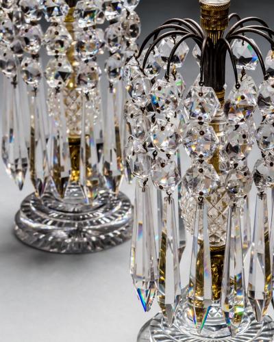 A PAIR OF DIAMOND STEP CUT REGENCY CANDLESTICKS