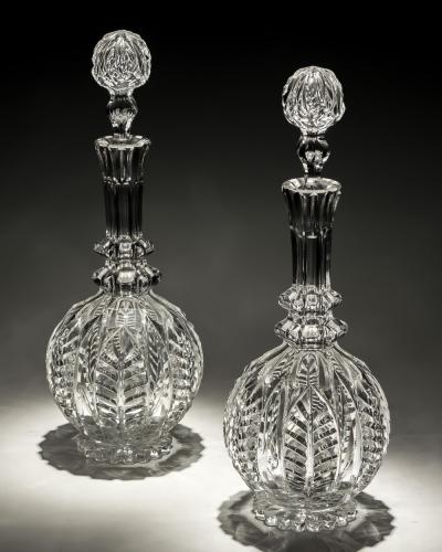 A PAIR OF ELABORATE VICTORIAN DECANTERS