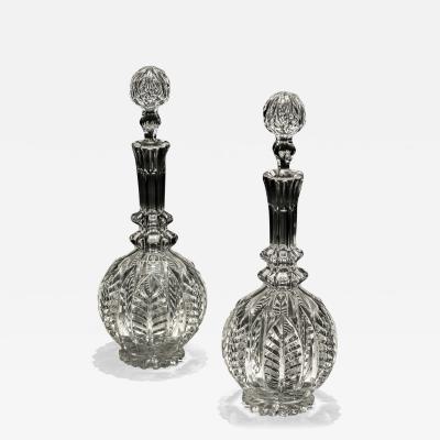 A PAIR OF ELABORATE VICTORIAN DECANTERS