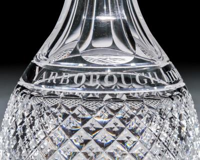 A PAIR OF ELABORATELY CUT DECANTERS OF MASONIC INTEREST