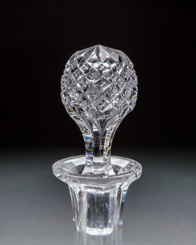 A PAIR OF ELABORATELY CUT DECANTERS OF MASONIC INTEREST