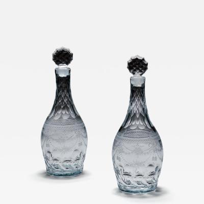 A PAIR OF ENGRAVED CONTINENTAL DECANTERS