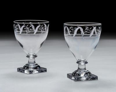 A PAIR OF ENGRAVED SQUARE BASE RUMMERS