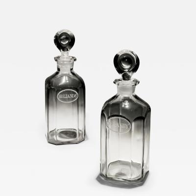A PAIR OF ENGRAVED SQUARE SPIRIT BOTTLES