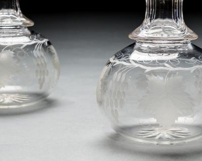 A PAIR OF ENGRAVED WATER CARAFES