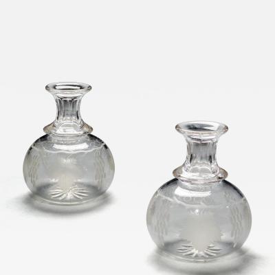 A PAIR OF ENGRAVED WATER CARAFES