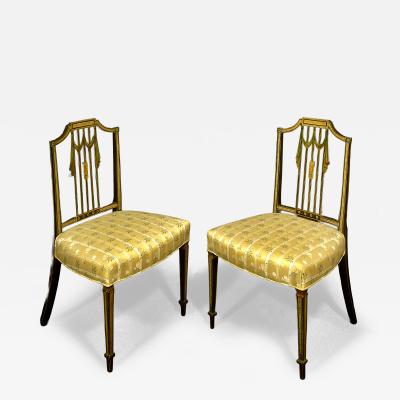 A PAIR OF GEORGE III BLACK PAINTED SIDE CHAIRS