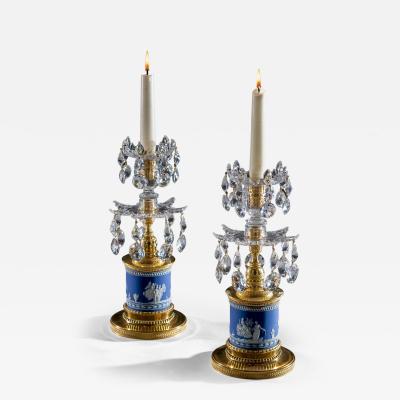 A PAIR OF GEORGE III CUT GLASS ORMOLU MOUNTED WEDGWOOD DRUM CANDLESTICKS