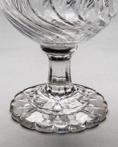 A PAIR OF GEORGE III CUT GLASS URNS COVERS OF EXCEPTIONAL SIZE QUALITY