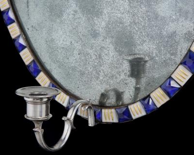 A PAIR OF GEORGE III IRISH OVAL MIRROR GIRANDOLES