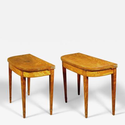 A PAIR OF GEORGE III SATINWOOD GAMES TABLES