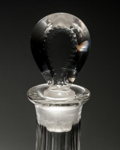 A PAIR OF GEORGIAN SLICE FLUTE SPIRIT DECANTERS