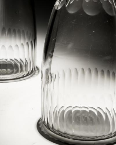 A PAIR OF GEORGIAN SLICE FLUTE SPIRIT DECANTERS