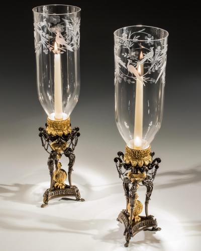 A PAIR OF GILT BRONZE GRIFFIN STORM LIGHTS