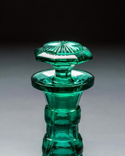 A PAIR OF GREEN SHAFT GLOBE DECANTERS