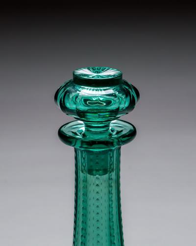 A PAIR OF GREEN SHAFT GLOBE DECANTERS